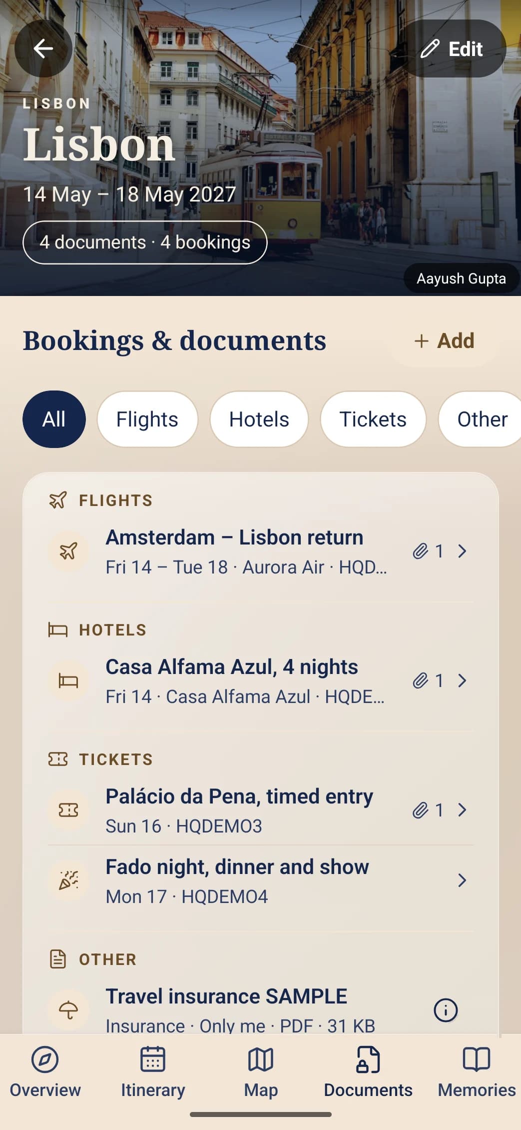 Reservations and documents of a Lisbon trip: the flight, the hotel, two tickets and a travel insurance kept as Only me